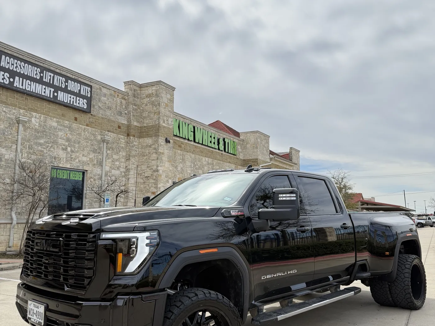 The King Wheel & Tire shop front on FM 1187 in Mansfield, TX