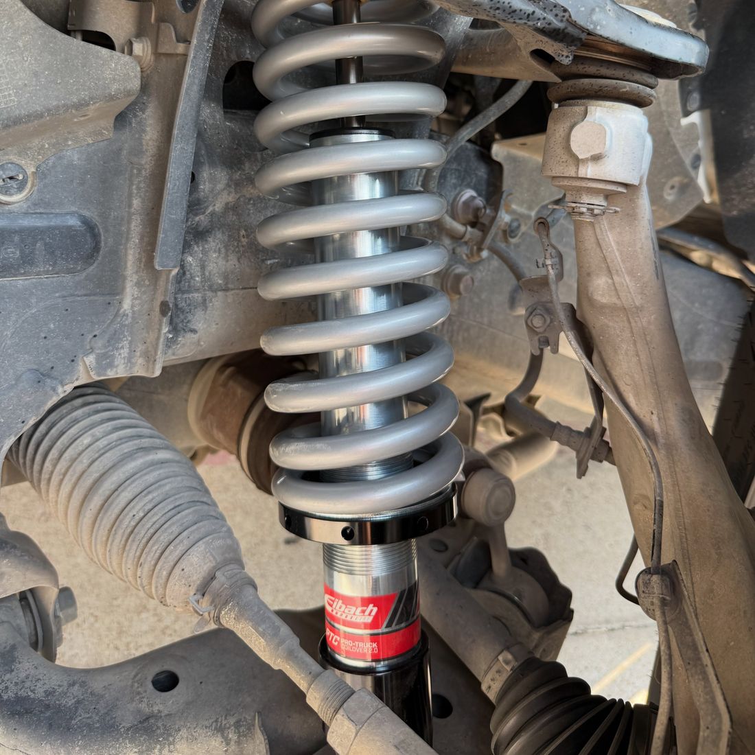 Coilover and shock replacement on a truck at King Wheel & Tire in Mansfield, TX