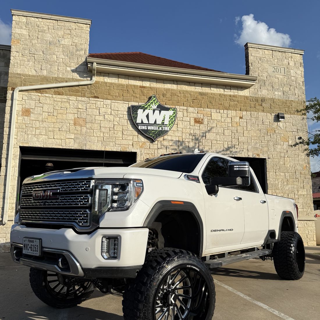 Lifted GMC Sierra Denali HD on forged wheels after suspension work in Mansfield, TX