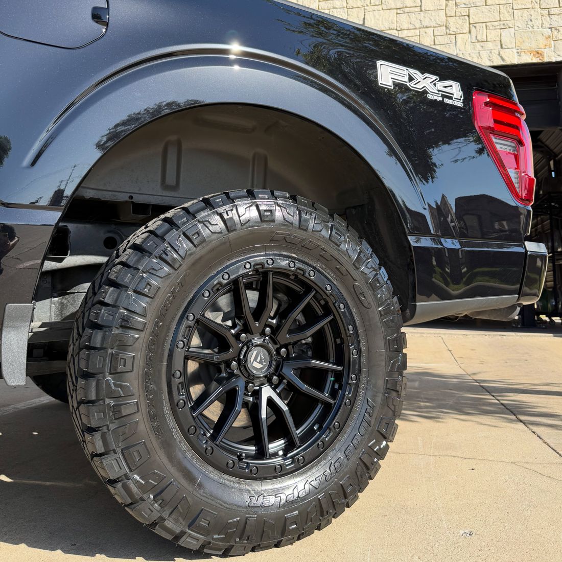 Mud-terrain tires mounted and balanced at King Wheel & Tire in Mansfield, TX